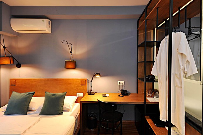 Imagen de la habitación del Hotel Elle Boutique. Foto 16