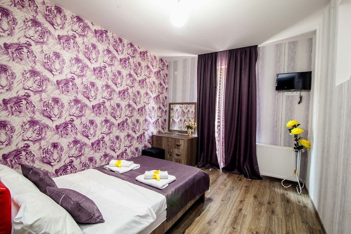 Imagen de la habitación del Hotel Ellegance. Foto 12