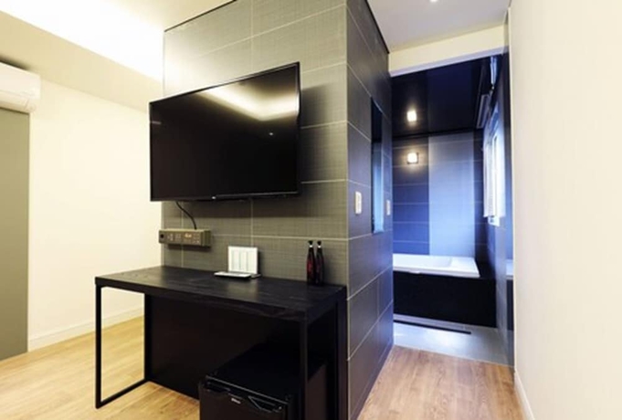 Imagen de la habitación del Hotel Elleinn. Foto 17