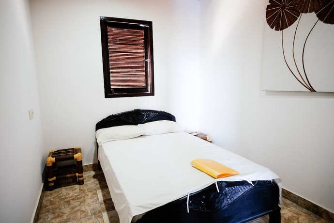 Imagen de la habitación del Hotel Ellie's. Foto 6