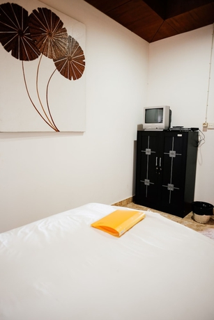 Imagen de la habitación del Hotel Ellie's. Foto 7