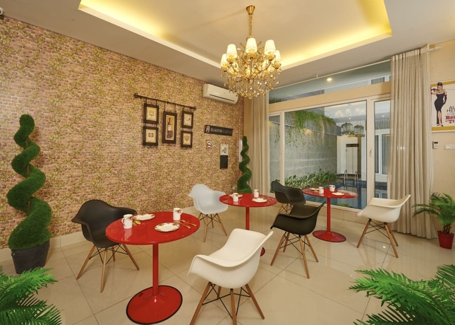 Imagen del bar/restaurante del Hotel Elliottii Residence Pondok Hijau. Foto 2