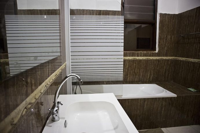 Imagen de la habitación del Hotel Ellisa Hospitality and. Foto 8