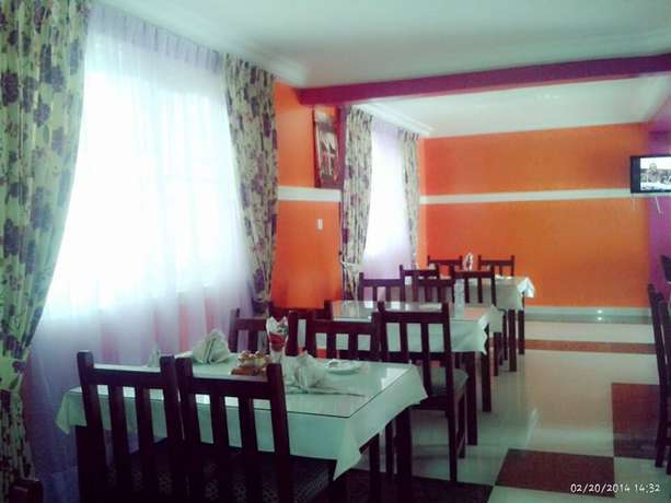 Imagen del bar/restaurante del Hotel Ellisa Hospitality and. Foto 5