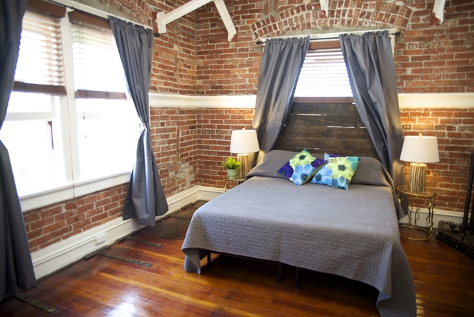 Imagen de la habitación del Hotel Ellison Suites. Foto 11