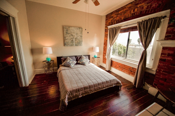 Imagen de la habitación del Hotel Ellison Suites. Foto 13