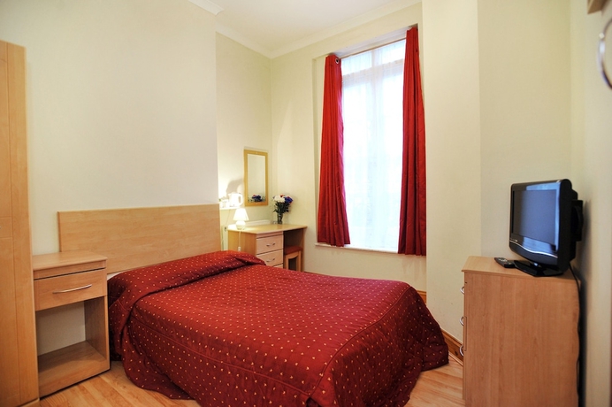 Imagen de la habitación del Hotel Elmwood. Foto 16