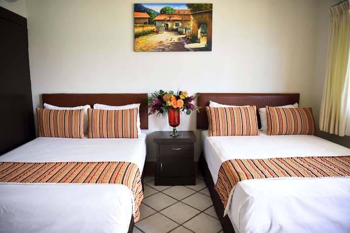 Imagen de la habitación del Hotel Eloisa - Near Playa De Los Muertos. Foto 2