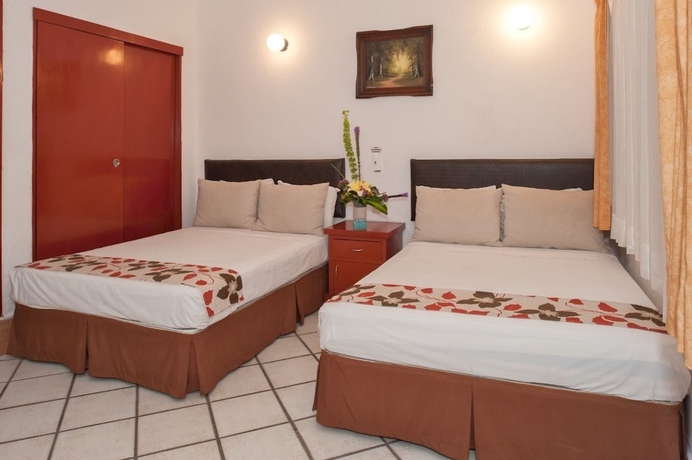 Imagen de la habitación del Hotel Eloisa - Near Playa De Los Muertos. Foto 6