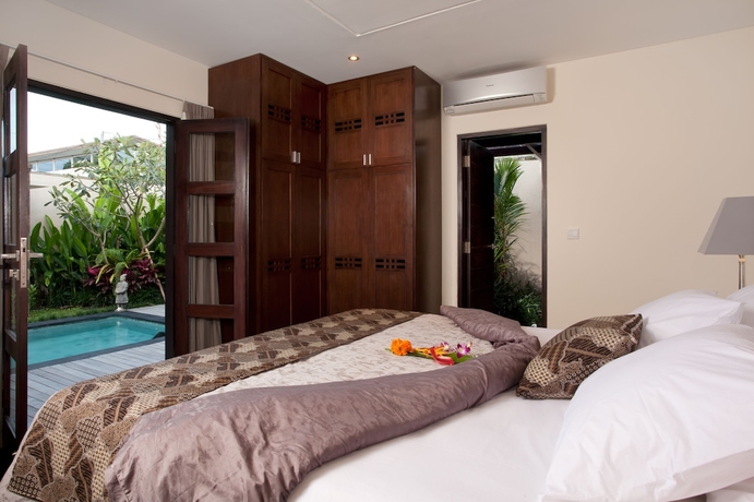 Imagen de la habitación del Hotel Elok Villas. Foto 3