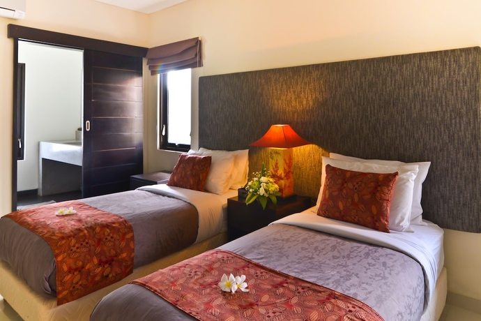 Imagen de la habitación del Hotel Elok Villas. Foto 5