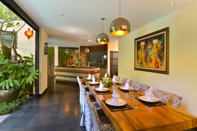 Imagen de la habitación del Hotel Elok Villas. Foto 7