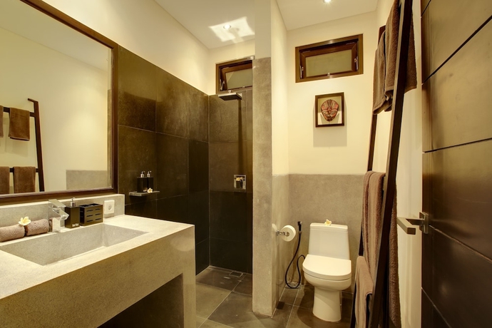 Imagen de la habitación del Hotel Elok Villas. Foto 12