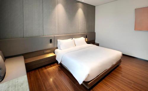 Imagen general del Hotel Elong Etang Guangzhou Baiyun Airport Renhe Railway Station. Foto 3