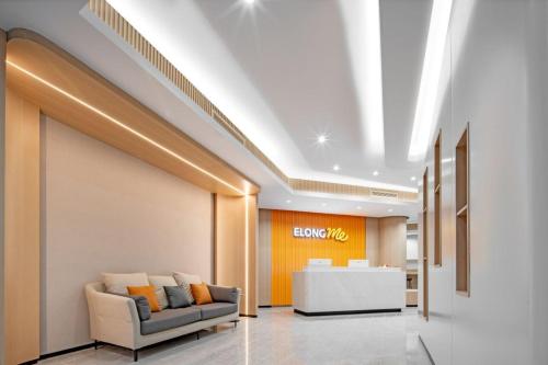 Imagen general del Hotel Elong Me Weihai Department Store Weigao Plaza. Foto 3