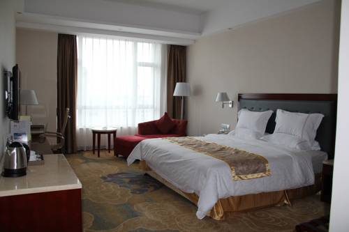 Imagen de la habitación del Hotel Elong Me, Zhongshan. Foto 3