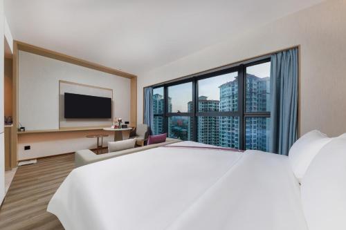 Imagen de la habitación del Hotel Elong Shenzhen South China City. Foto 15