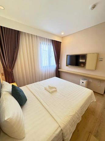 Imagen de la habitación del Hotel Elong me, Ho Chi Minh. Foto 5