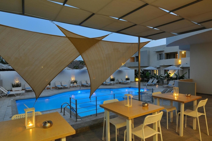 Imagen del bar/restaurante del Hotel Elounda Garden Suites. Foto 2