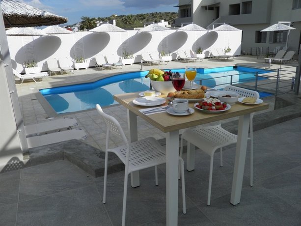 Imagen del bar/restaurante del Hotel Elounda Garden Suites. Foto 4