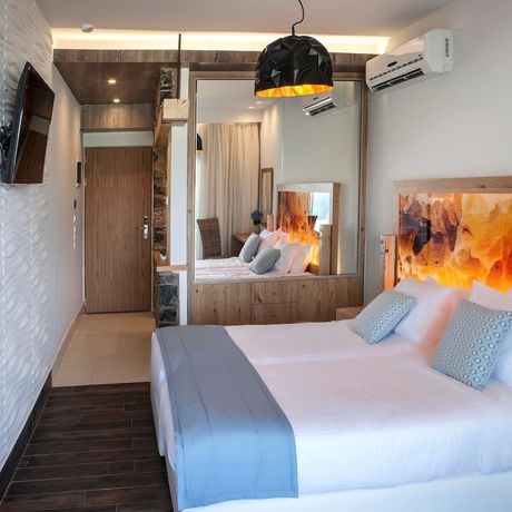 Imagen de la habitación del Hotel Elounda Orama Boutique. Foto 8