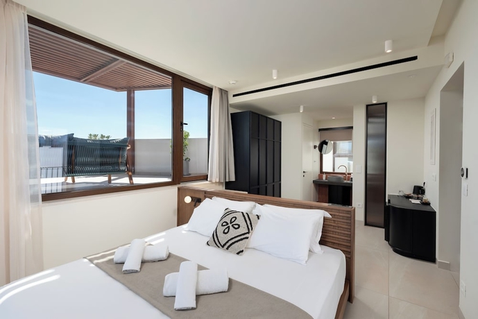 Imagen de la habitación del Hotel Elounda Stories Boutique. Foto 7
