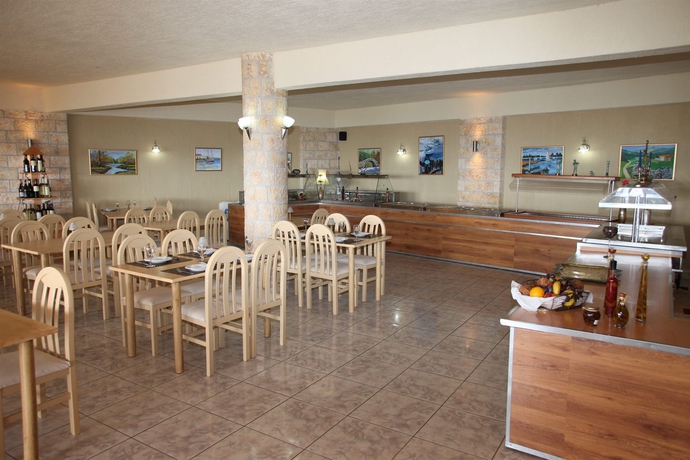 Imagen del bar/restaurante del Hotel Elounda Water Park Residence. Foto 1