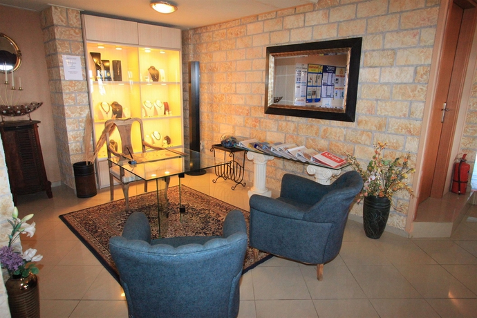 Imagen de los interiores del Hotel Elounda Water Park Residence. Foto 7