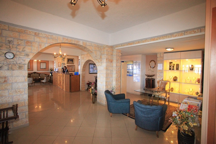 Imagen de los interiores del Hotel Elounda Water Park Residence. Foto 9