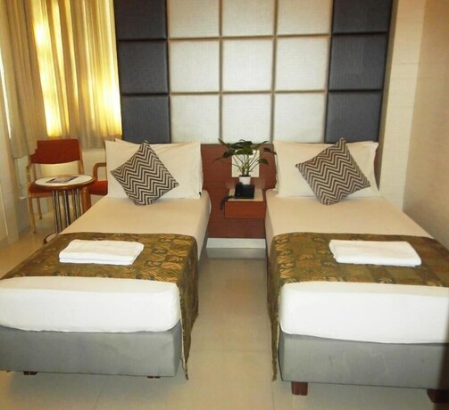 Imagen de la habitación del Hotel Elphinstone. Foto 20