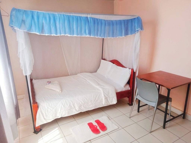 Imagen de la habitación del Hotel Elris Guest House and. Foto 5