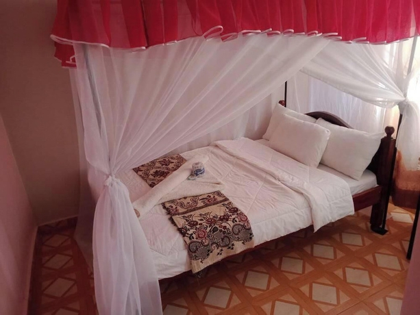 Imagen de la habitación del Hotel Elris Guest House and. Foto 11