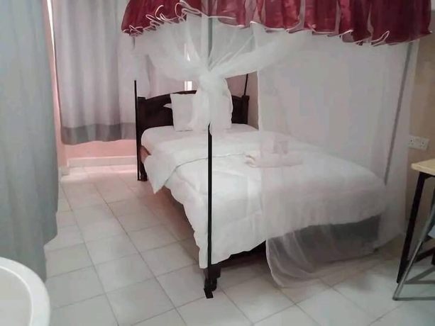 Imagen de la habitación del Hotel Elris Guest House and. Foto 12