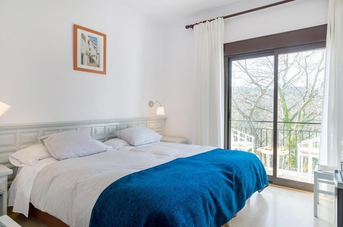 Imagen de la habitación del Hotel Els Caçadors De Maçanet. Foto 13