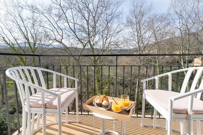 Imagen de la habitación del Hotel Els Caçadors De Maçanet. Foto 15