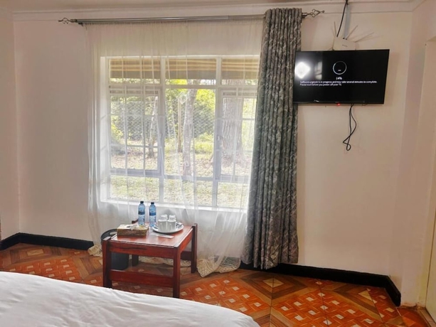 Imagen de la habitación del Hotel Elsamere Lodge Naivasha. Foto 6