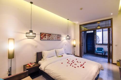 Imagen de la habitación del Hotel Elsewhere Boutique. Foto 6