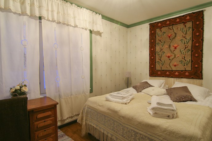 Imagen de la habitación del Hotel Elves Village. Foto 10