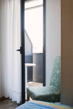 Imagen de la habitación del Hotel Elvia, Lignano Sabbiadoro. Foto 11