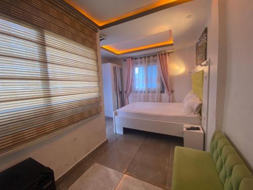 Imagen de la habitación del Hotel Elvira\'s HOME, Douala. Foto 14