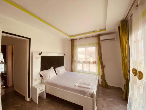 Imagen de la habitación del Hotel Elvira\'s HOME, Douala. Foto 16