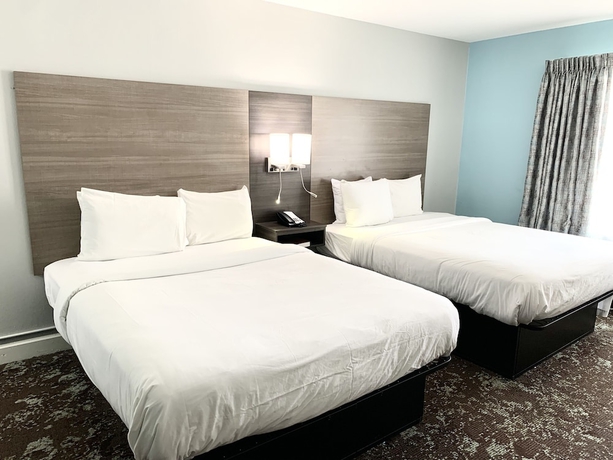 Imagen de la habitación del Hotel Elwood and Suites. Foto 13