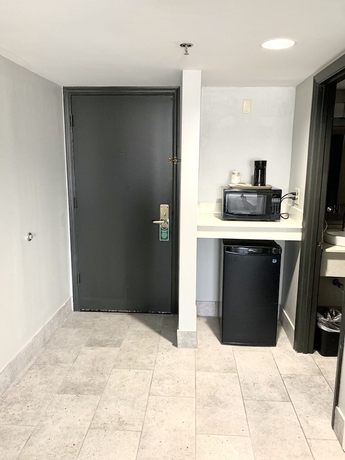 Imagen de la habitación del Hotel Elwood and Suites. Foto 14