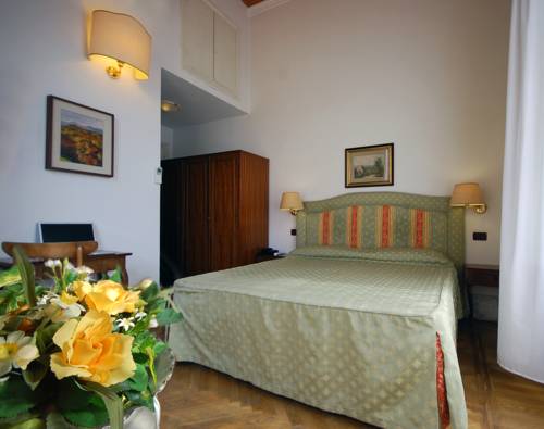 Imagen de la habitación del Hotel Ely, Viareggio. Foto 15