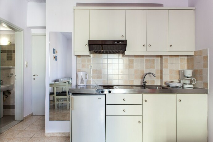 Imagen de la habitación del Hotel Elychryson. Foto 30