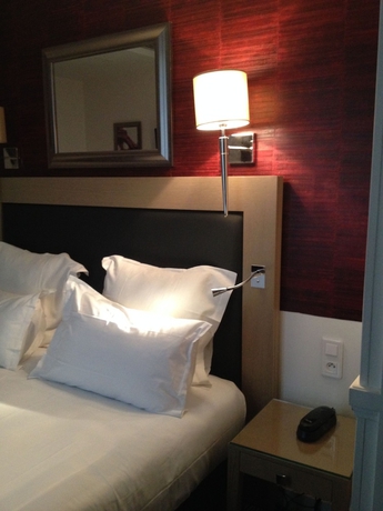 Imagen de la habitación del Hotel Elysées Flaubert. Foto 6