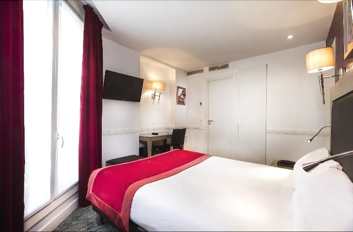 Imagen de la habitación del Hotel Elysées Flaubert. Foto 14