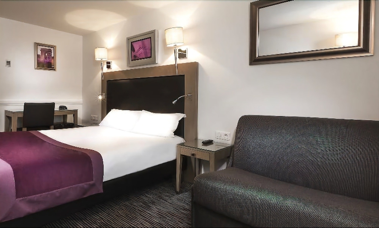 Imagen de la habitación del Hotel Elysées Flaubert. Foto 15