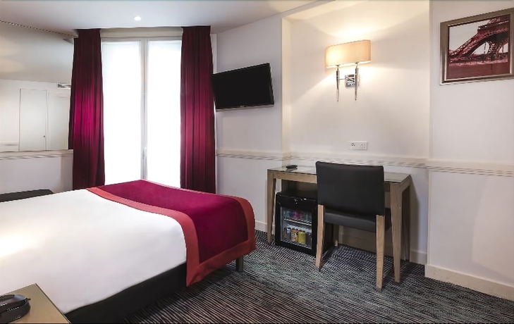 Imagen de la habitación del Hotel Elysées Flaubert. Foto 17