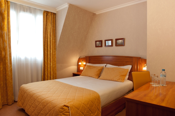 Imagen de la habitación del Hotel Elys&eacute;es Op&eacute;ra. Foto 10